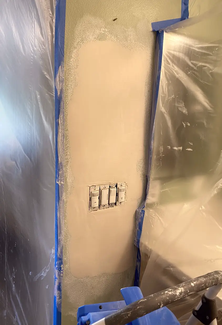 Repaired drywall patch in Anaheim with a smooth, flat finish; hole rebuilt and blended without visible seams or shadows.