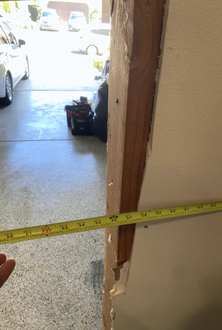 Patched wall hole in Anaheim, surface fully skimmed and blended with surrounding drywall showing a smooth, even finish with no visible seams.