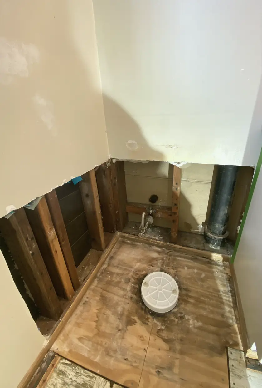 Patched drywall hole with smooth, even surface, fully blended and no visible seams under natural light in Brea.