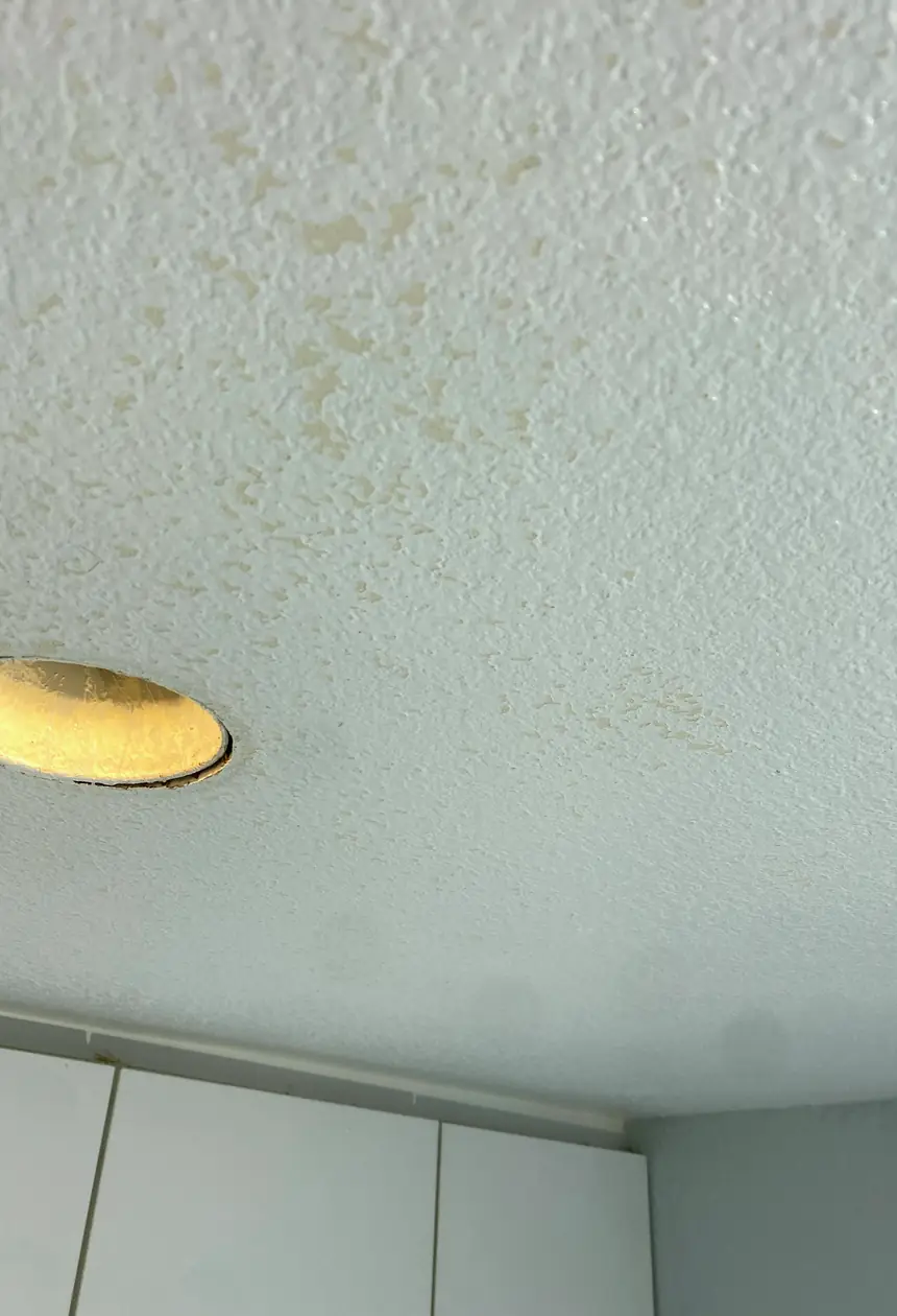 Repaired hole in drywall, surface smoothly skimmed and blended with surrounding wall, no visible seams or shadows in Cypress home.