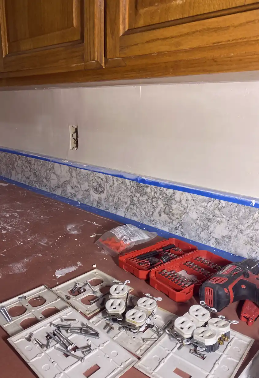 Seamless drywall repair where a large hole was patched and the surface smoothed with blended paint and no visible seams.