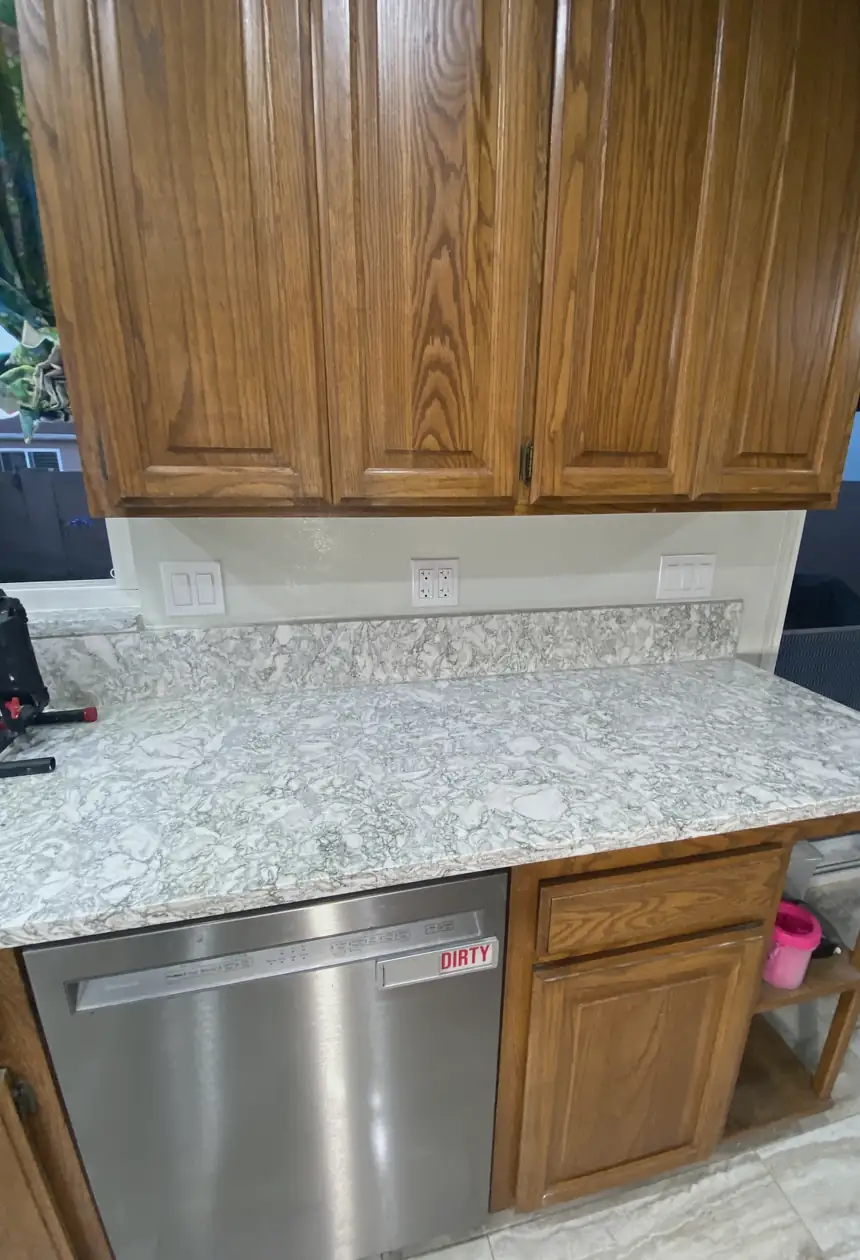 Repaired drywall patch in Huntington Beach, seamless blend with smooth, flat surface and no visible seams or shadows.