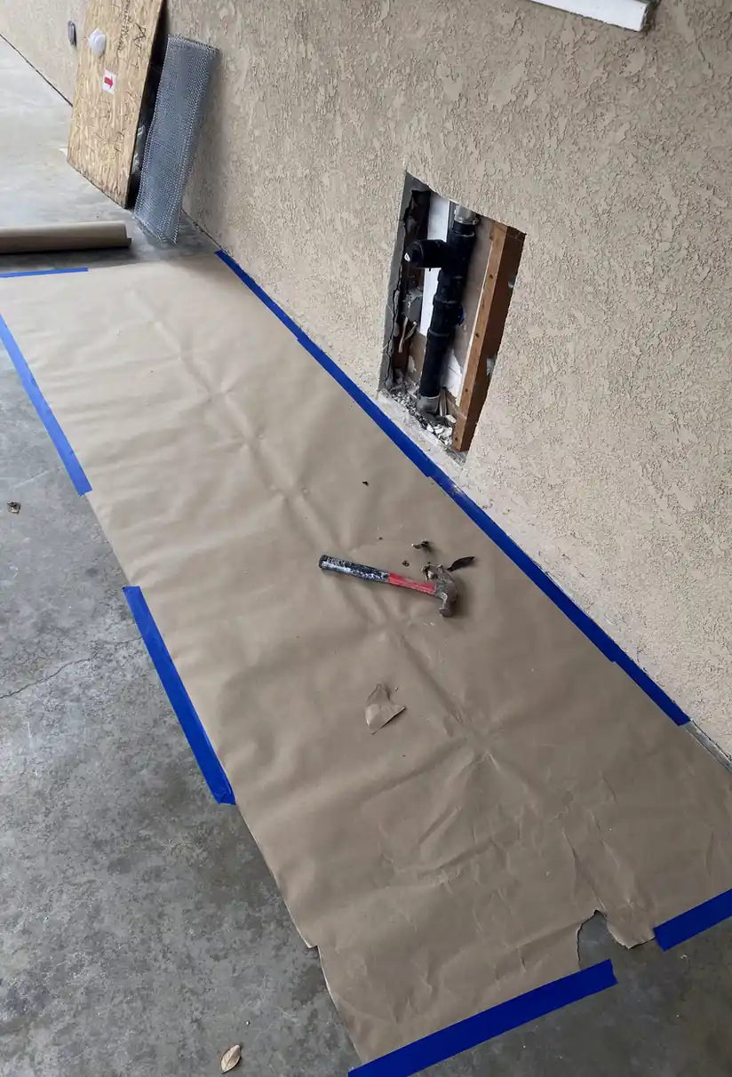 Drywall patch in Irvine showing a smooth, seamless surface after fixing a large hole, fully blended with no shadows or visible seams.