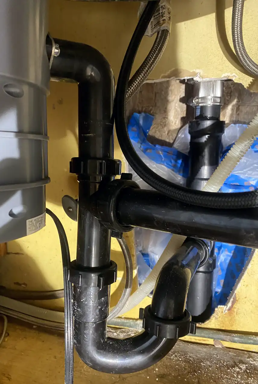 A large hole patched and skimmed smoothly, wall surface perfectly blended with original paint, no shadows or seams visible.