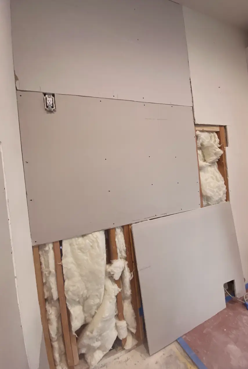 Patched drywall hole in Mission Viejo, wall surface smooth and even with no visible seams or shadows