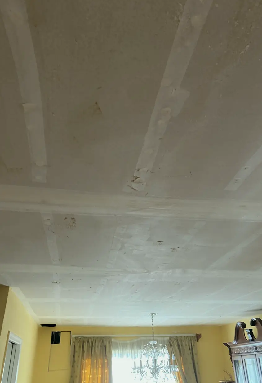 Repaired drywall in Placentia with a patched hole that now shows a smooth, flat surface with even lighting and no visible seams.