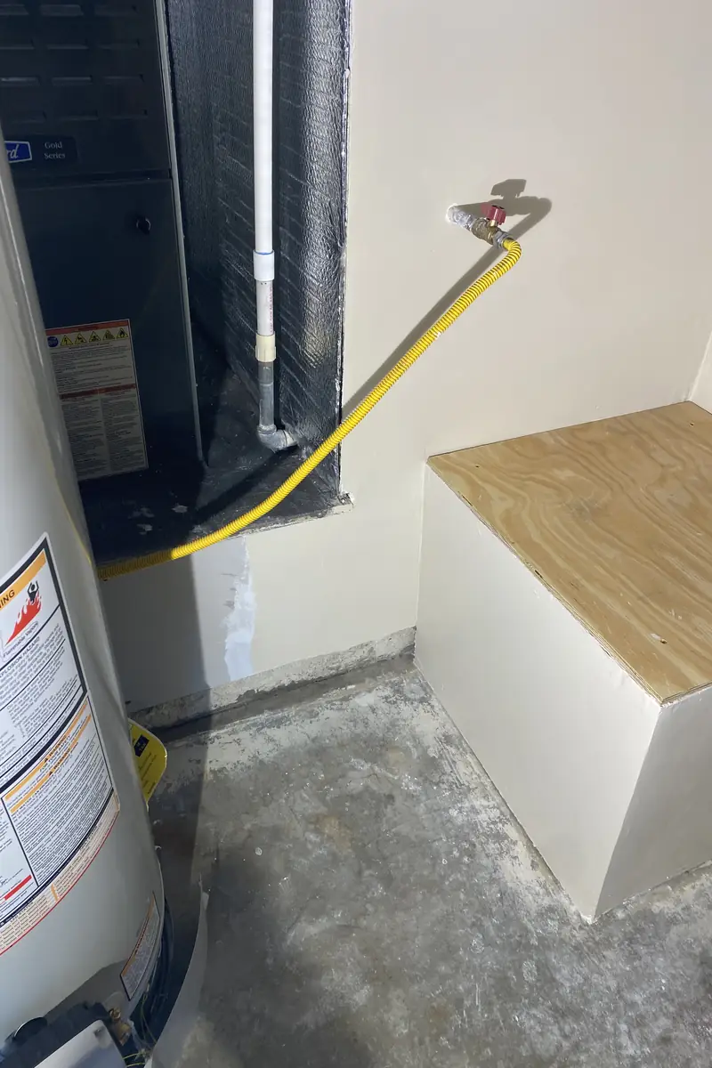 Repaired drywall hole in San Clemente, patched and skimmed smooth, wall surface even with no visible seams or shadows.