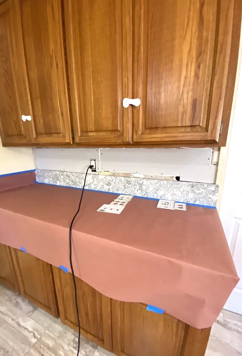 Patched drywall hole with a smooth, blended surface showing no seams or shadows under natural light.