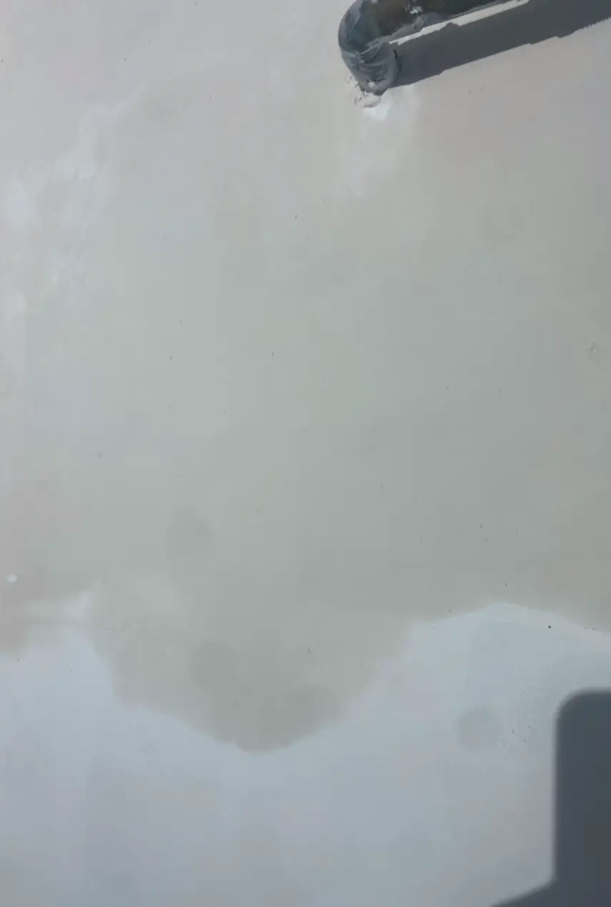 Drywall patch in Westminster showing a smooth, flat surface after fixing a large hole with no visible seams or shadows.