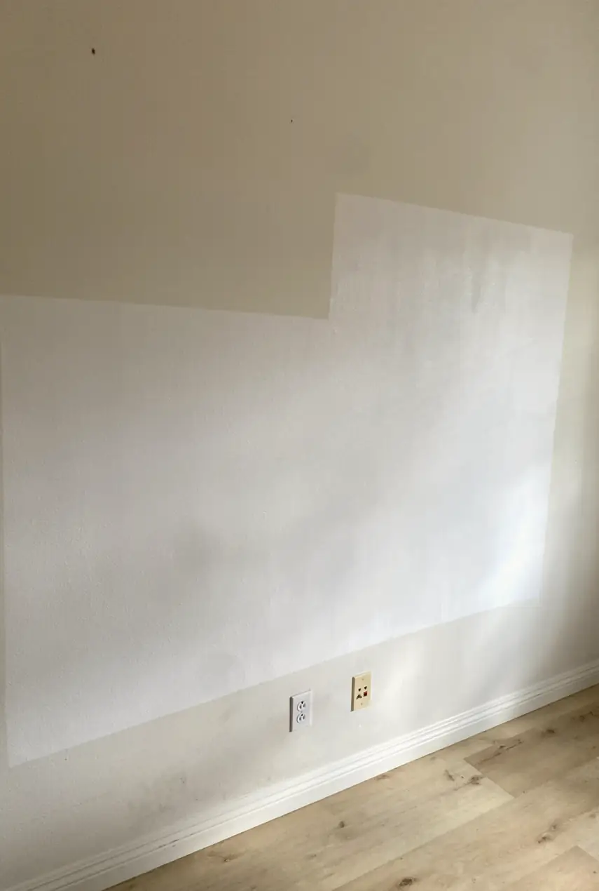 Repaired drywall hole flawlessly patched and blended to a smooth, flat surface with no visible seams or shadows in Yorba Linda home.